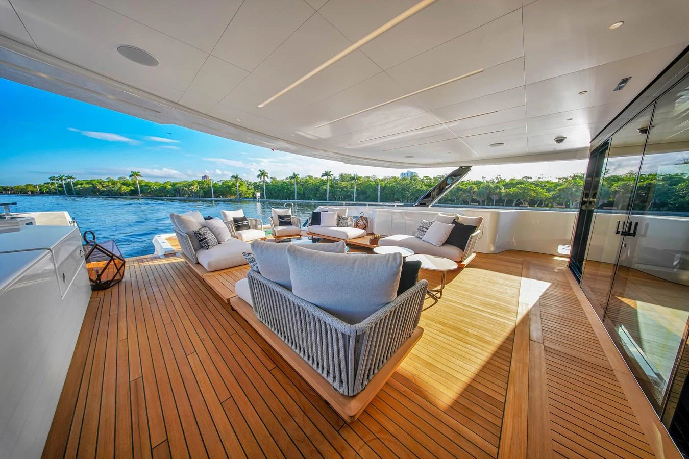 The aft deck offers a spacious and luxurious outdoor living area with comfortable seating and stunning views. aboard BAGLIETTO DOM 133 #5 Yacht for Sale