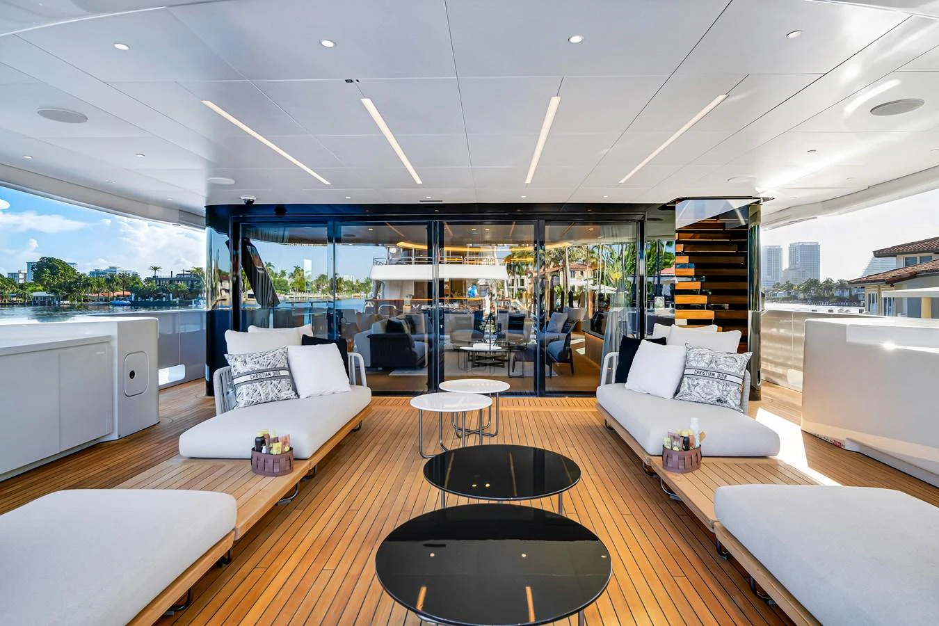 The aft deck features luxurious seating with a stunning view of the water. aboard BAGLIETTO DOM 133 #5 Yacht for Sale