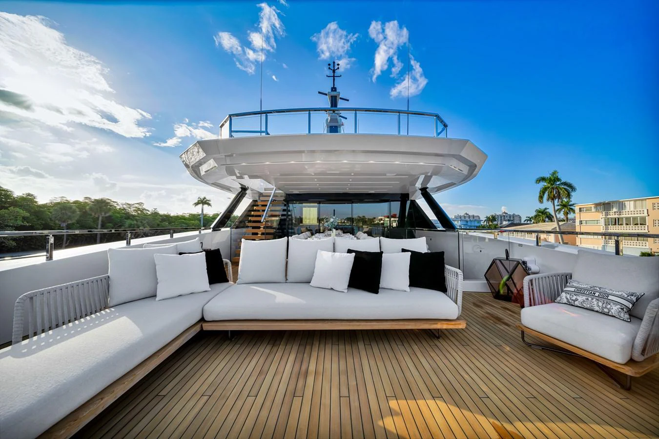 The sundeck offers a spacious and luxurious lounging area with plush seating and stunning views. aboard BAGLIETTO DOM 133 #5 Yacht for Sale