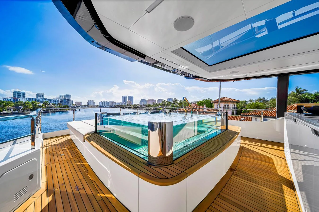 The sundeck features a luxurious jacuzzi with stunning views of the surrounding water and cityscape. aboard BAGLIETTO DOM 133 #5 Yacht for Sale