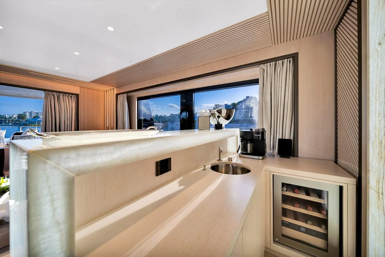 The yacht's galley features modern appliances and a sleek design with ample natural light. aboard BAGLIETTO DOM 133 #5 Yacht for Sale