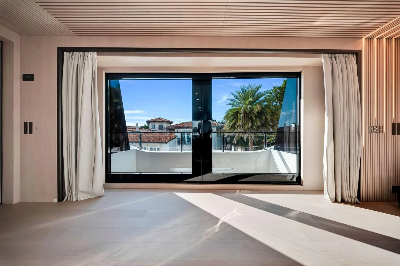 A spacious interior area with large windows offering a view of the outside. aboard BAGLIETTO DOM 133 #5 Yacht for Sale