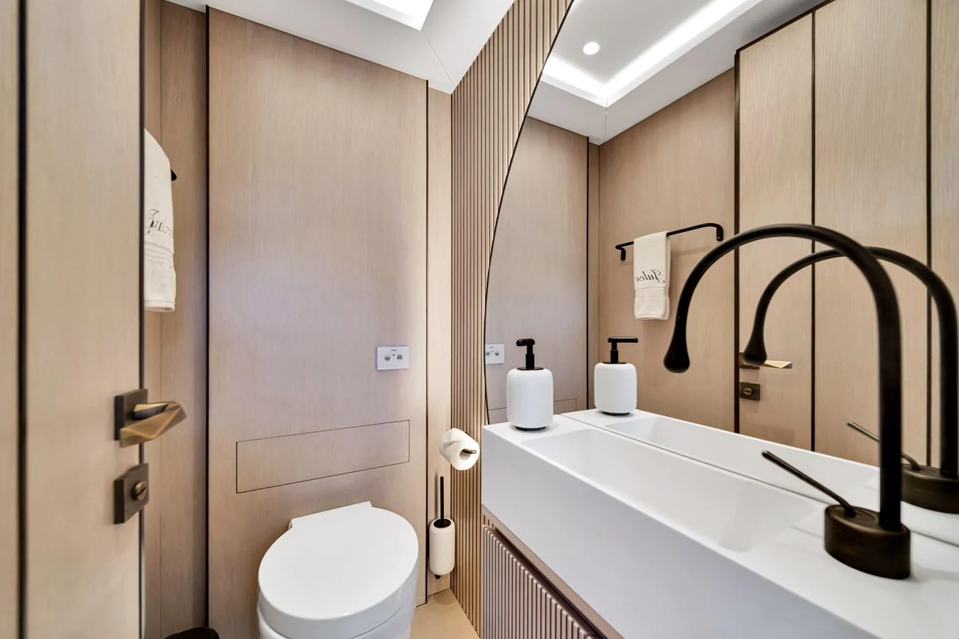 A modern yacht bathroom with sleek fixtures and elegant design. aboard BAGLIETTO DOM 133 #5 Yacht for Sale