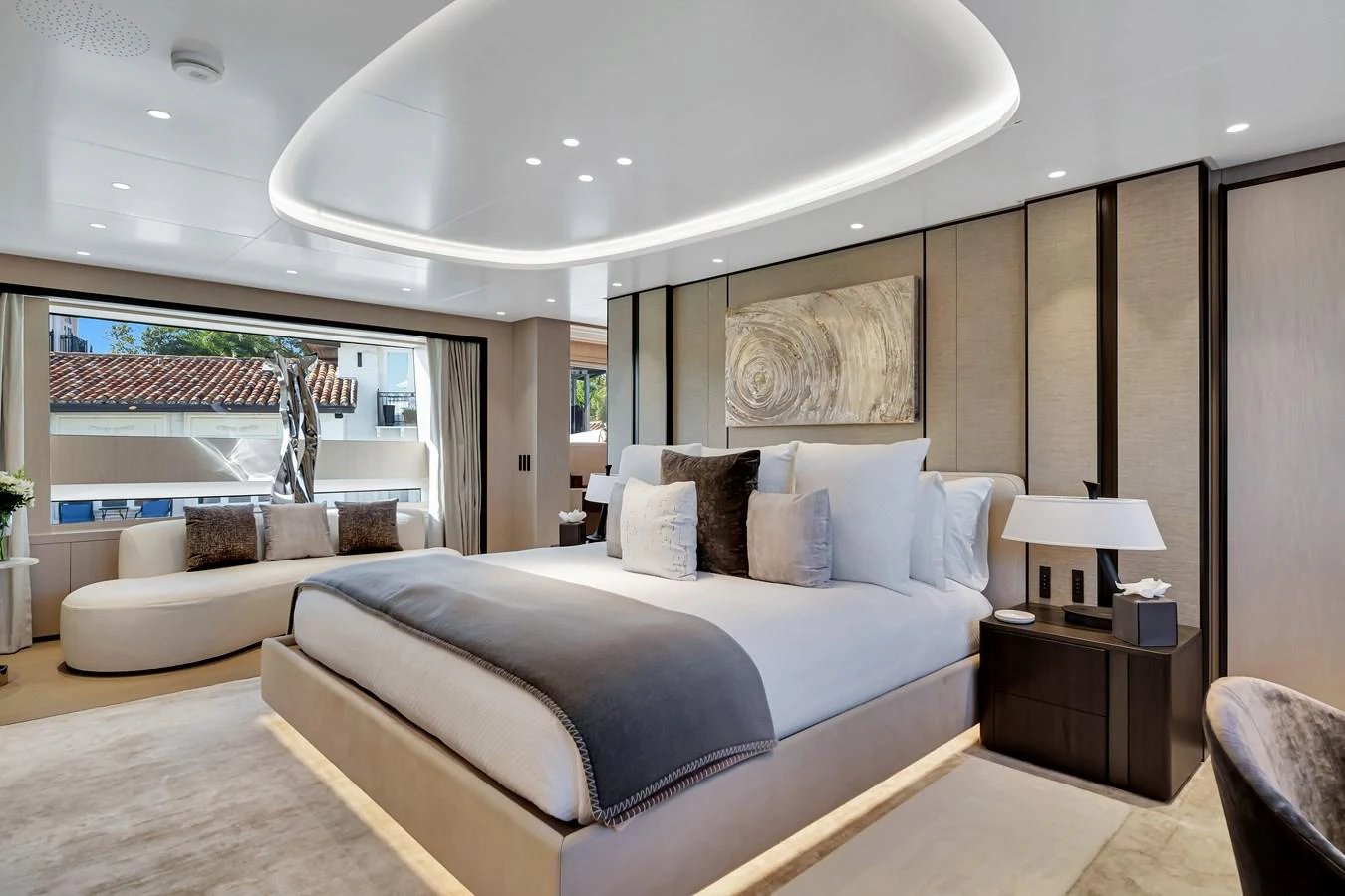 The master stateroom features a luxurious bed with plush pillows and elegant decor, offering a serene and comfortable retreat. aboard BAGLIETTO DOM 133 #5 Yacht for Sale
