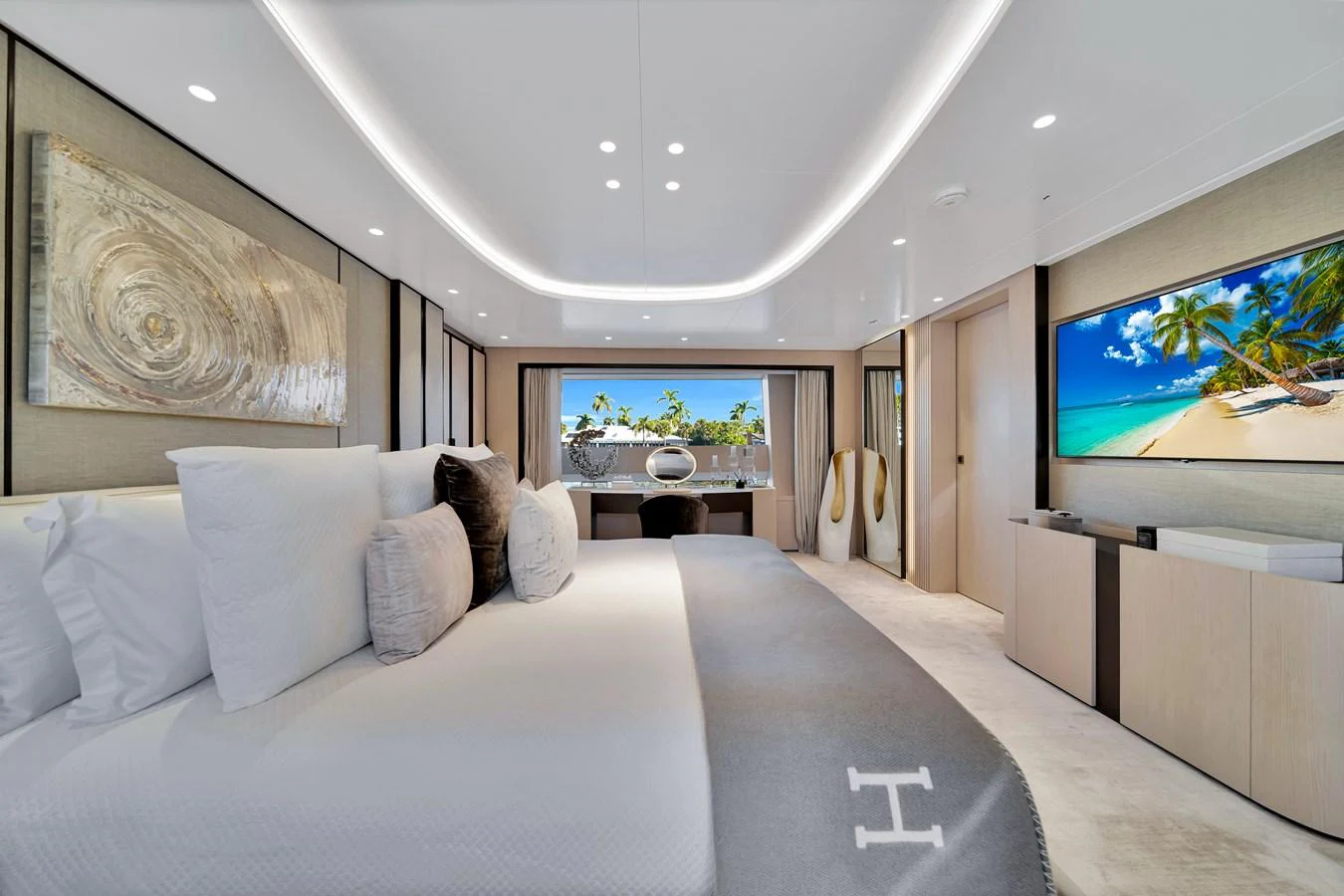 The master stateroom offers a luxurious and serene retreat with modern decor and stunning views. aboard BAGLIETTO DOM 133 #5 Yacht for Sale