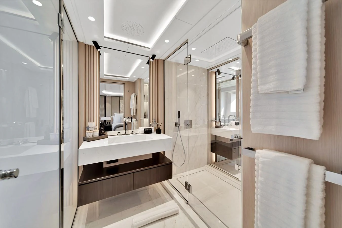 The yacht's bathroom features a sleek, modern design with luxurious fixtures and ample lighting. aboard BAGLIETTO DOM 133 #5 Yacht for Sale