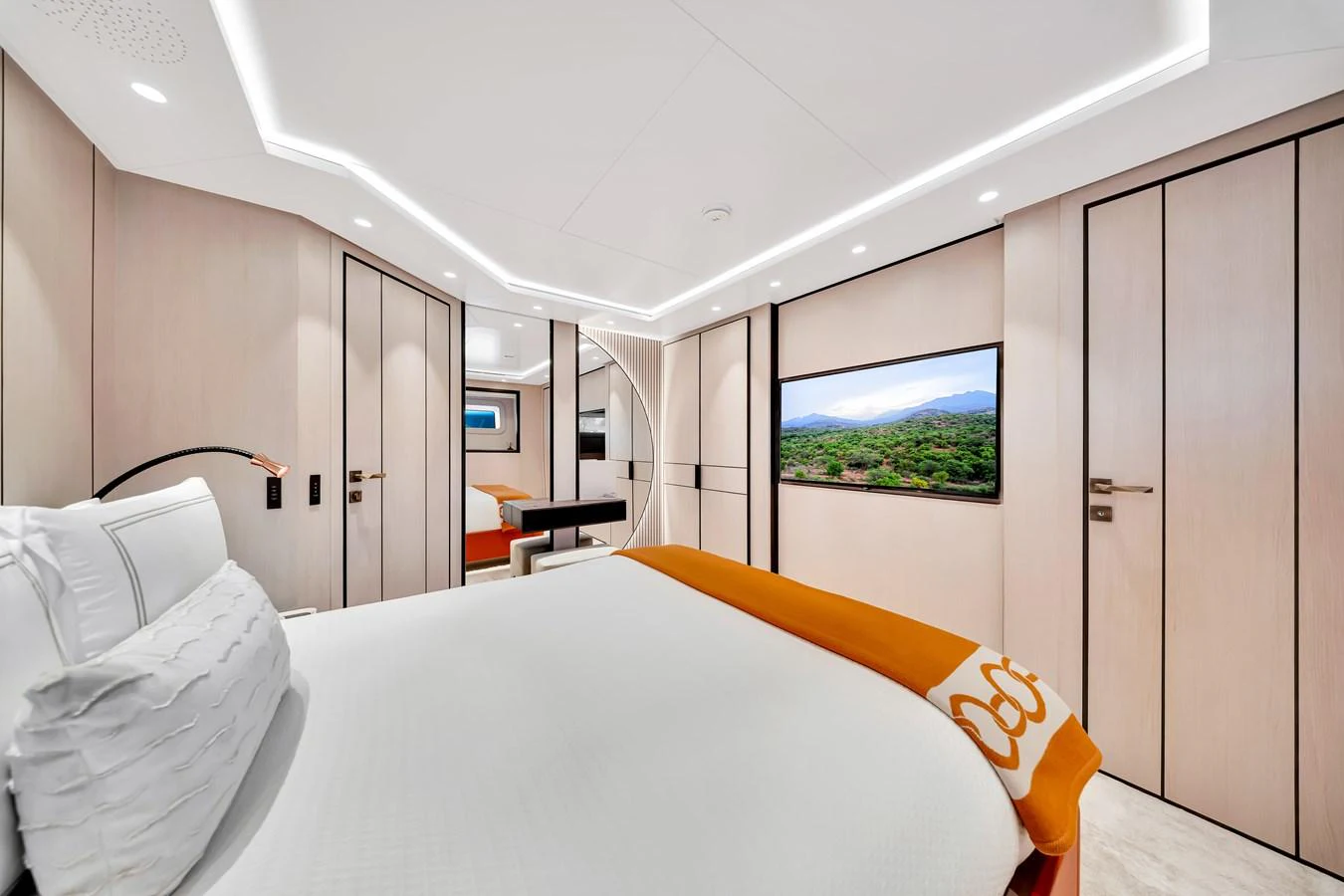 The stateroom features a luxurious bed with modern decor and ample natural light. aboard BAGLIETTO DOM 133 #5 Yacht for Sale