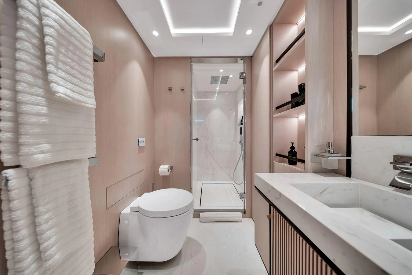 A luxurious bathroom with modern fixtures and elegant lighting. aboard BAGLIETTO DOM 133 #5 Yacht for Sale