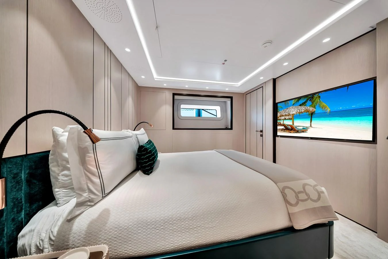 A luxurious stateroom with a large bed and modern decor. aboard BAGLIETTO DOM 133 #5 Yacht for Sale