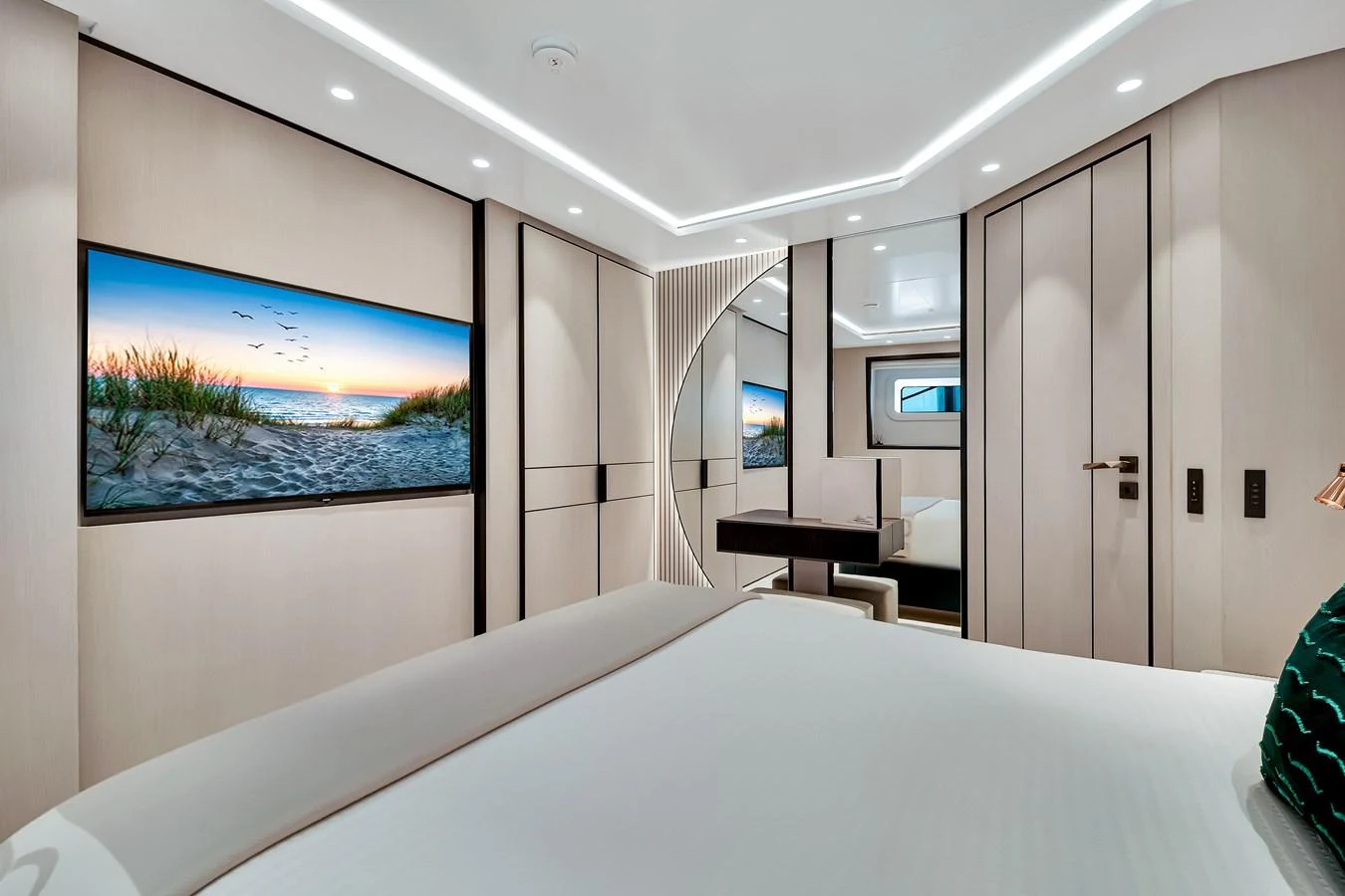 A luxurious stateroom featuring modern decor and a serene ambiance. aboard BAGLIETTO DOM 133 #5 Yacht for Sale