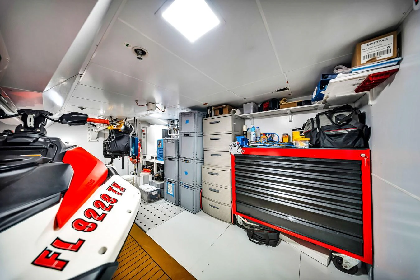 The yacht's storage area is well-organized with various tools and equipment neatly arranged. aboard BAGLIETTO DOM 133 #5 Yacht for Sale