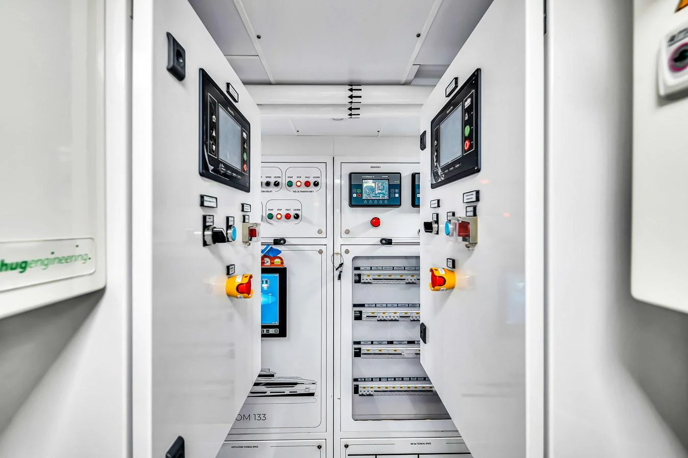 The image showcases the yacht's well-organized and high-tech engine room control panels. aboard BAGLIETTO DOM 133 #5 Yacht for Sale