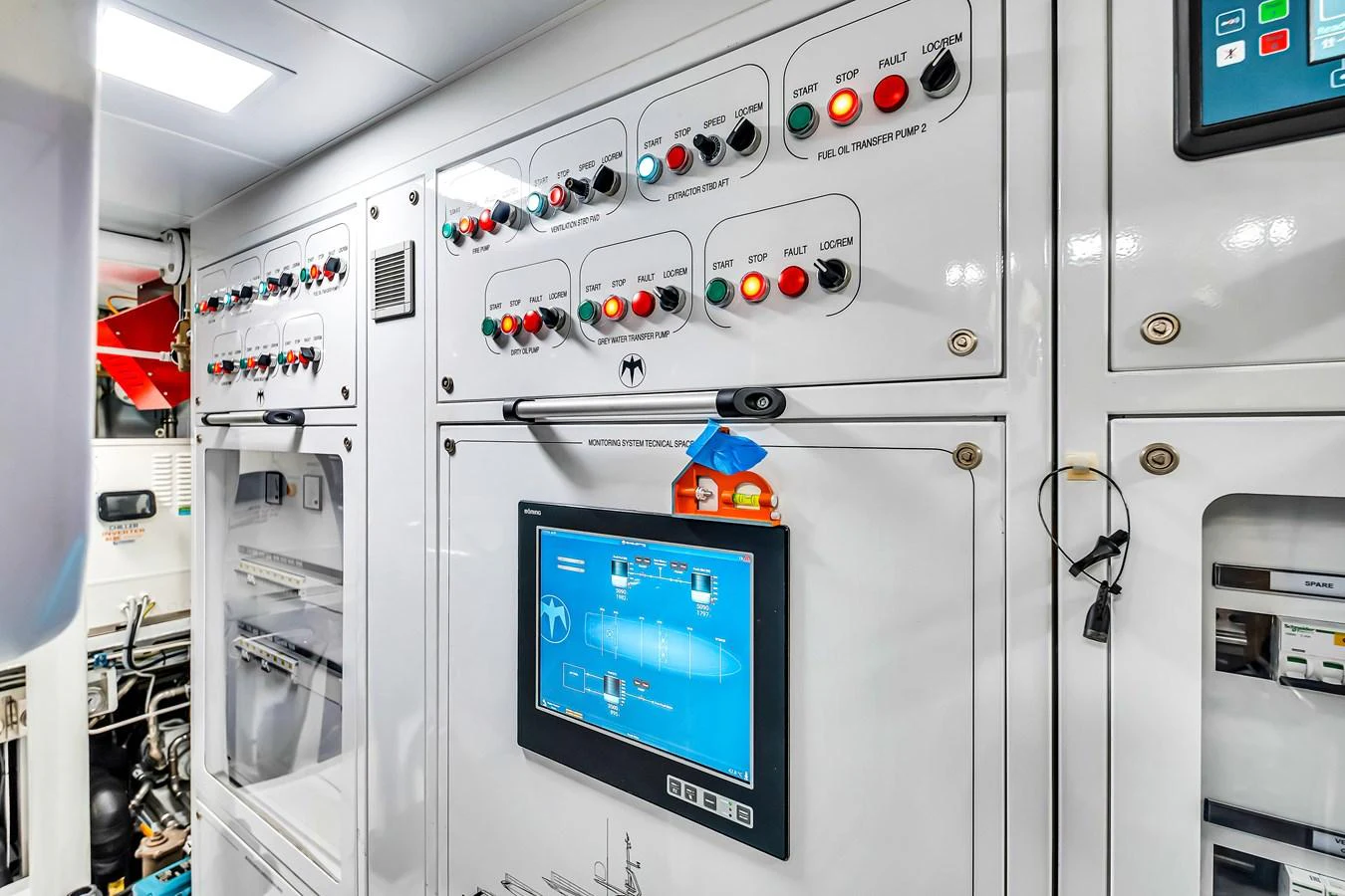 The image showcases the yacht's control room with various control panels and a central display screen. aboard BAGLIETTO DOM 133 #5 Yacht for Sale