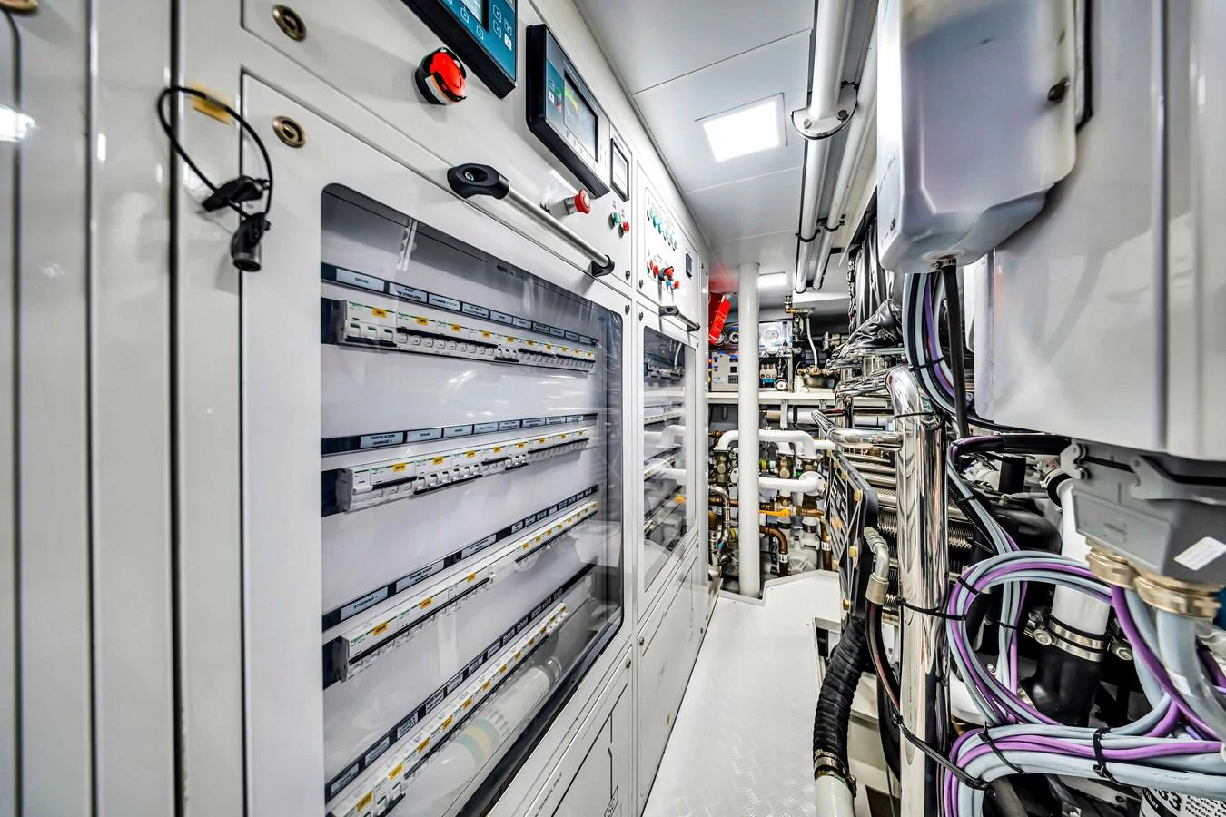 The yacht's engine room showcases a well-organized and high-tech setup, emphasizing functionality and precision. aboard BAGLIETTO DOM 133 #5 Yacht for Sale