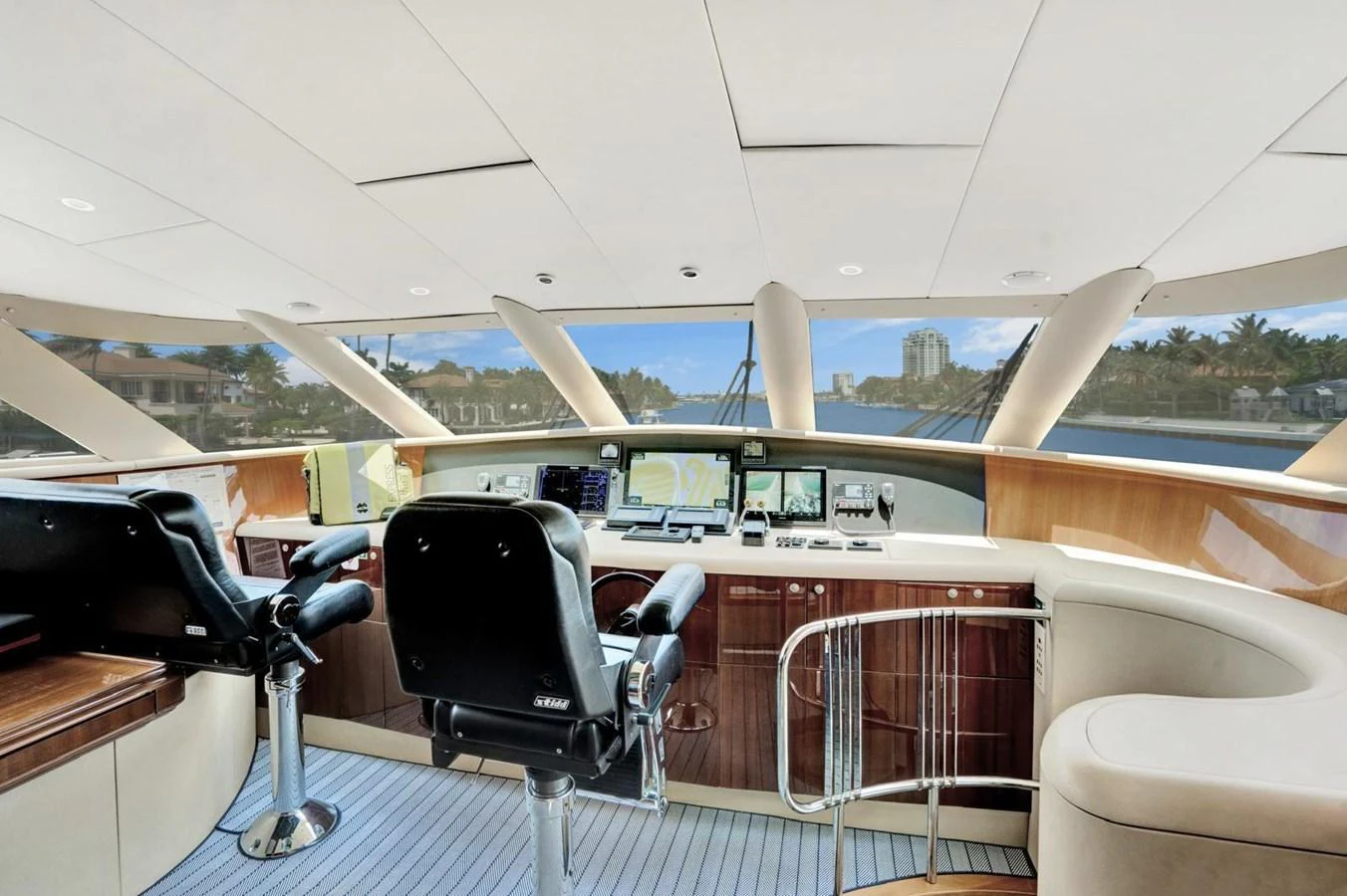The helm station offers a panoramic view with state-of-the-art navigation equipment and luxurious seating. aboard TRANQUILITY IV - 94 FT LAZZARA MOTORYACHT 2001 Yacht for Sale