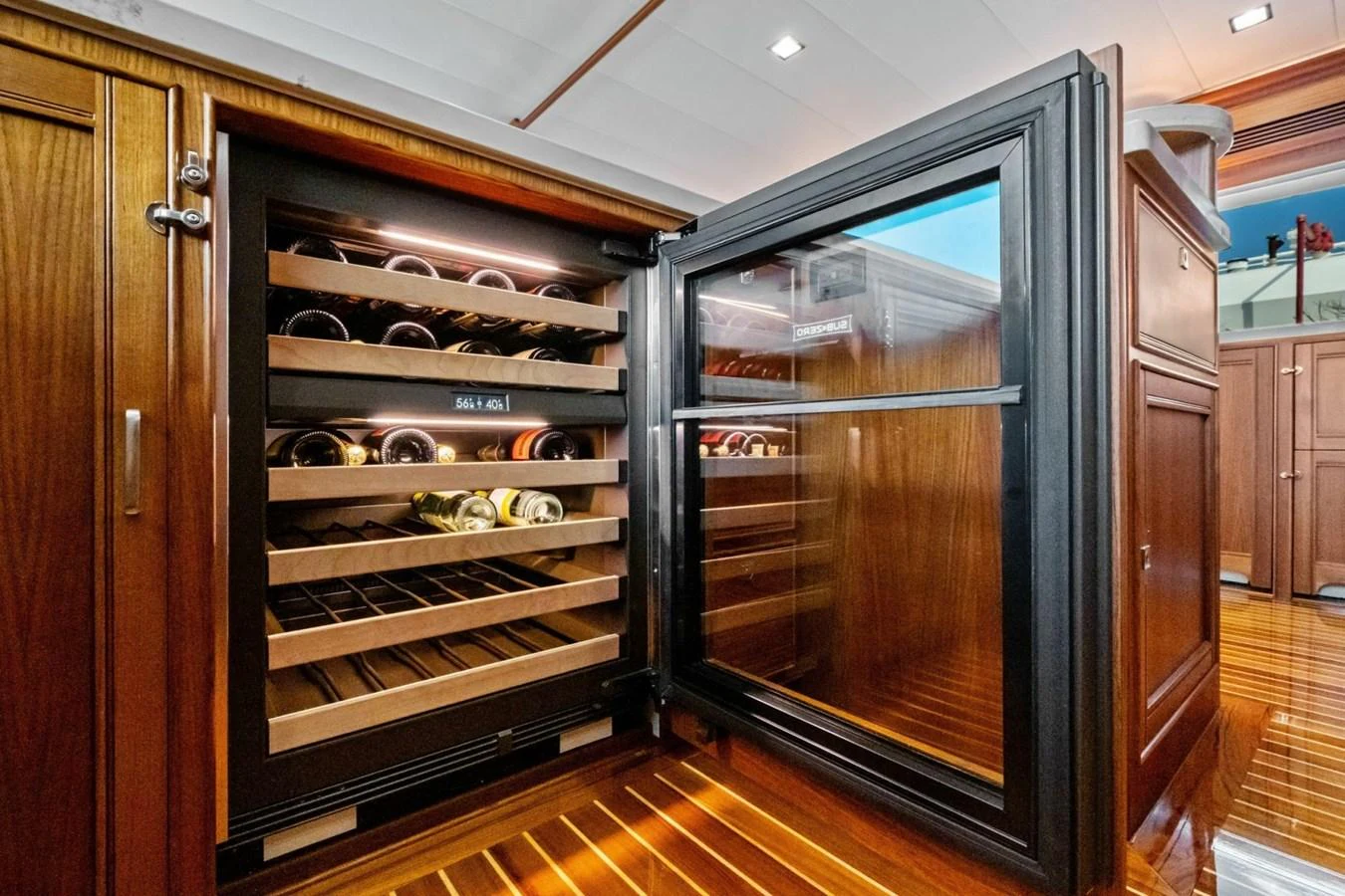 This yacht features an elegant wine cellar with ample storage for fine wines. aboard ARTEMIS II Yacht for Sale