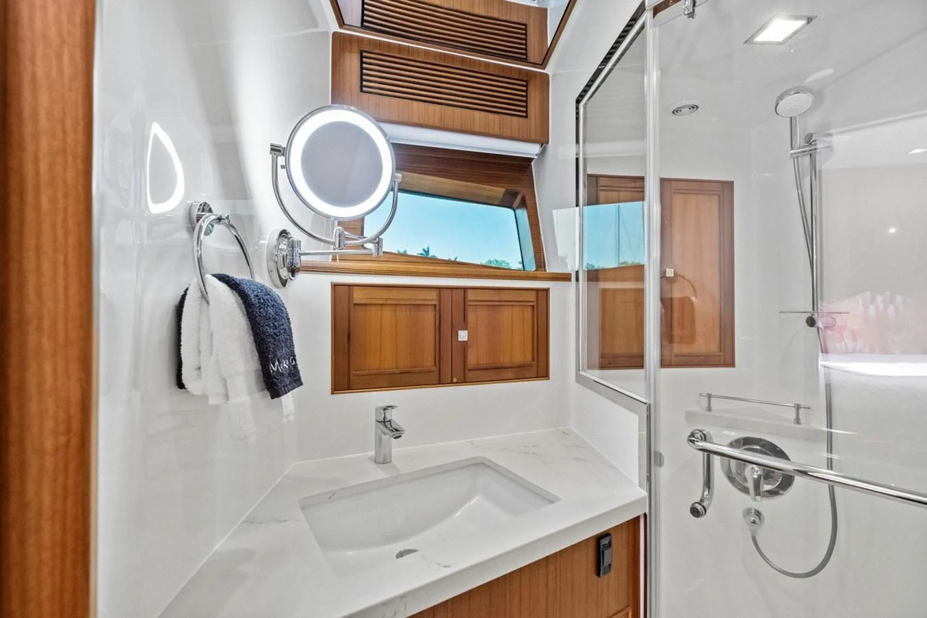 The yacht's bathroom features modern fixtures and a sleek design. aboard ARTEMIS II Yacht for Sale