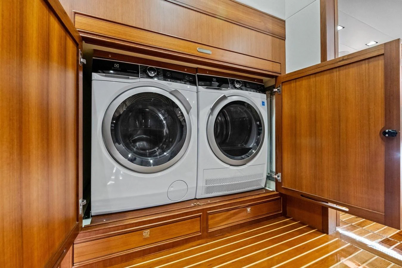 The yacht features a well-equipped laundry area with modern appliances. aboard ARTEMIS II Yacht for Sale