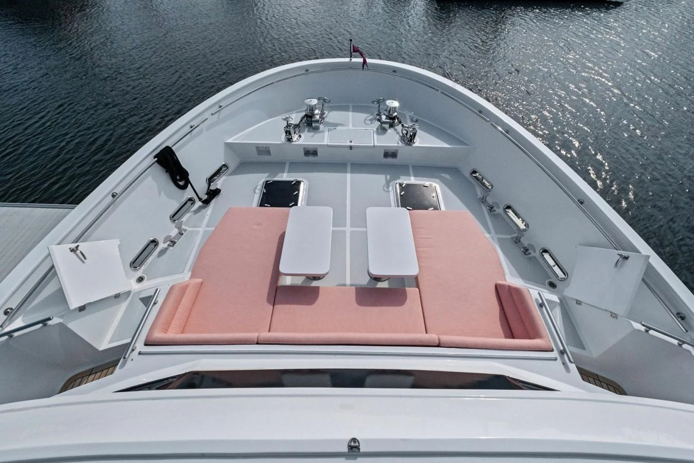 The foredeck features a spacious sunbathing area with comfortable seating and tables, perfect for relaxation. aboard ARTEMIS II Yacht for Sale