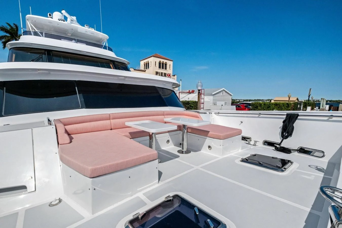 The foredeck features comfortable seating and a table, perfect for relaxation and socializing. aboard ARTEMIS II Yacht for Sale