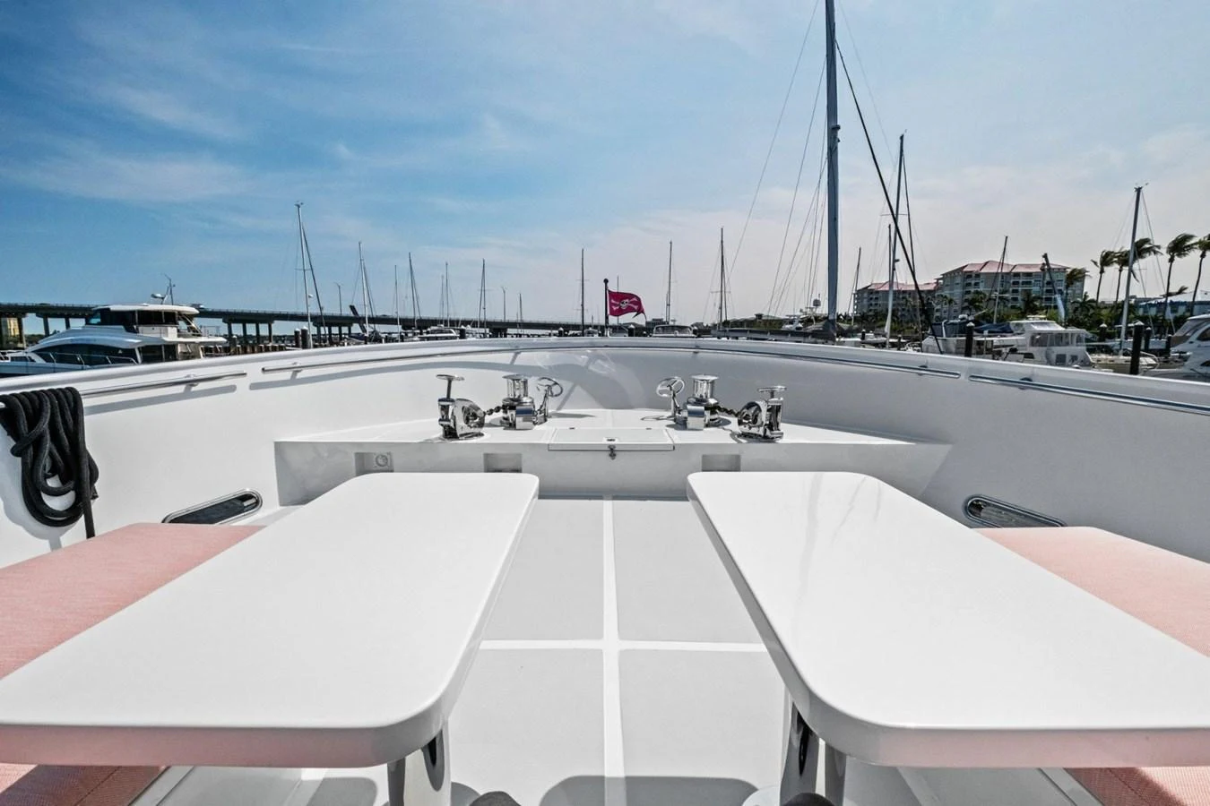 The foredeck features a spacious seating area with tables, perfect for outdoor dining and relaxation. aboard ARTEMIS II Yacht for Sale