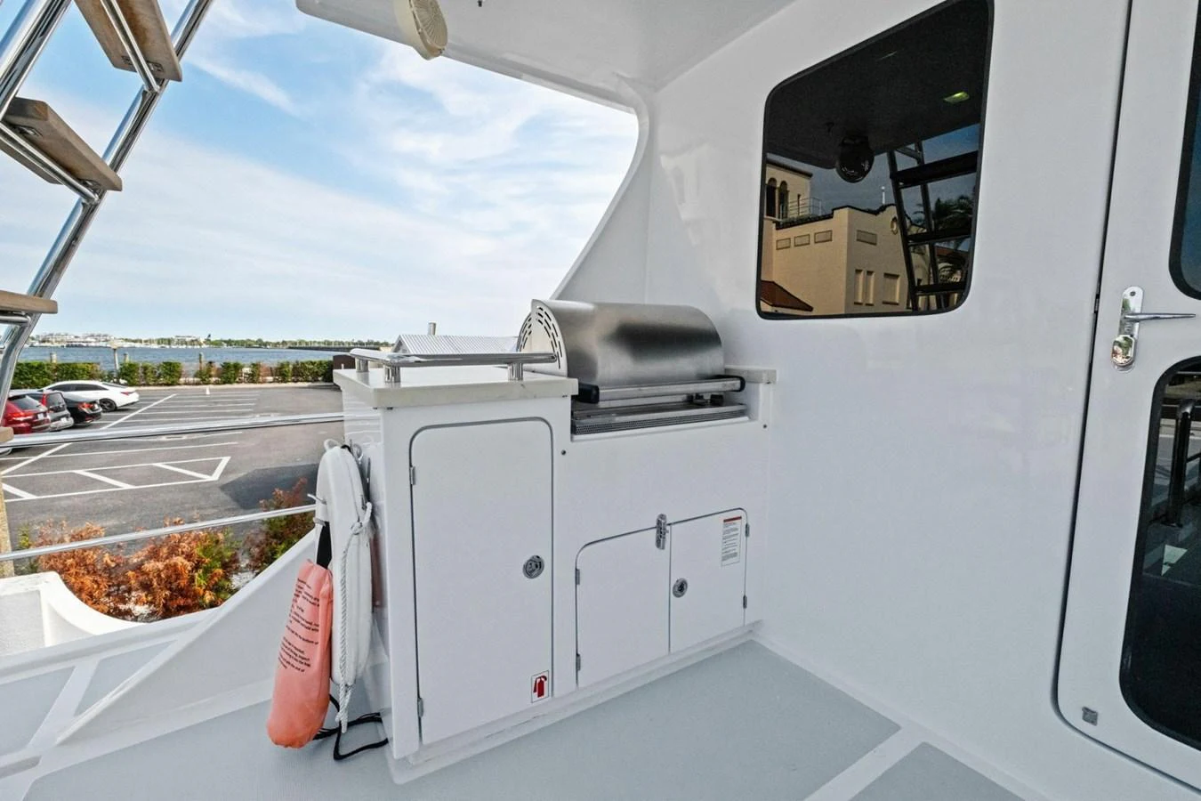 The yacht features a sleek outdoor grill area, perfect for alfresco dining. aboard ARTEMIS II Yacht for Sale
