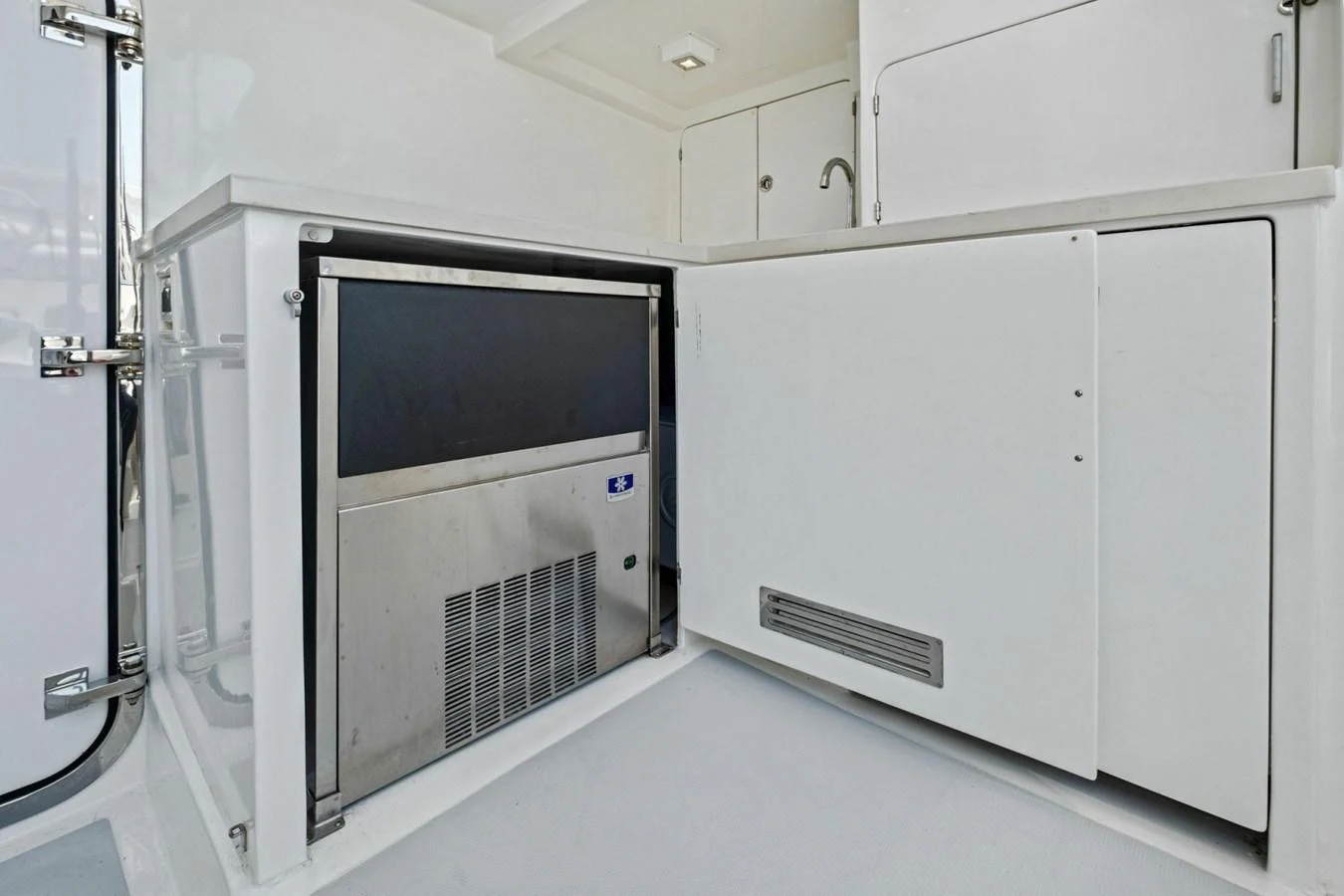 This image showcases a sleek and modern refrigeration unit on the yacht. aboard ARTEMIS II Yacht for Sale