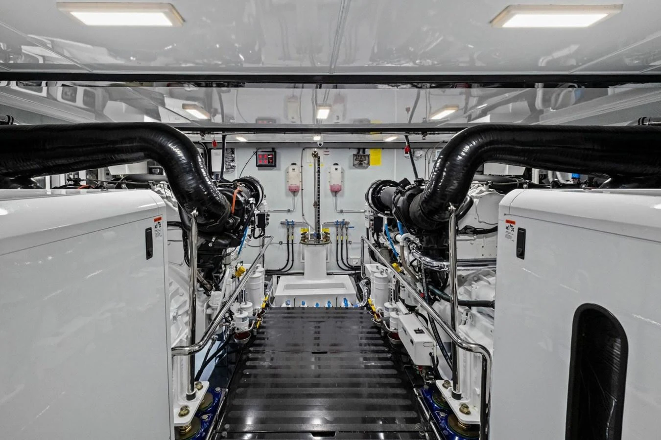 The engine room showcases a pristine and well-organized mechanical space. aboard ARTEMIS II Yacht for Sale