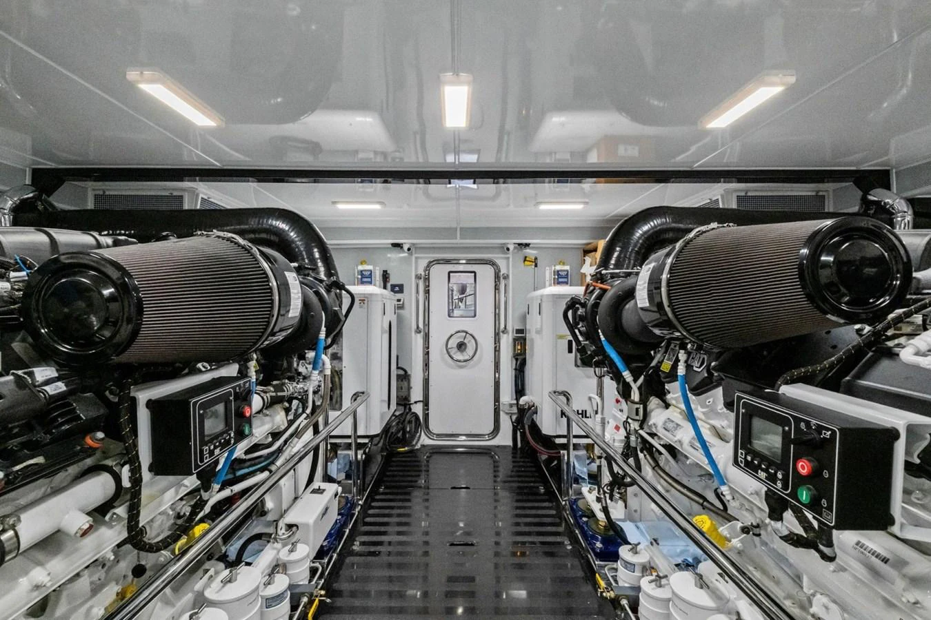 The image showcases a well-maintained engine room with advanced machinery and clean surroundings. aboard ARTEMIS II Yacht for Sale