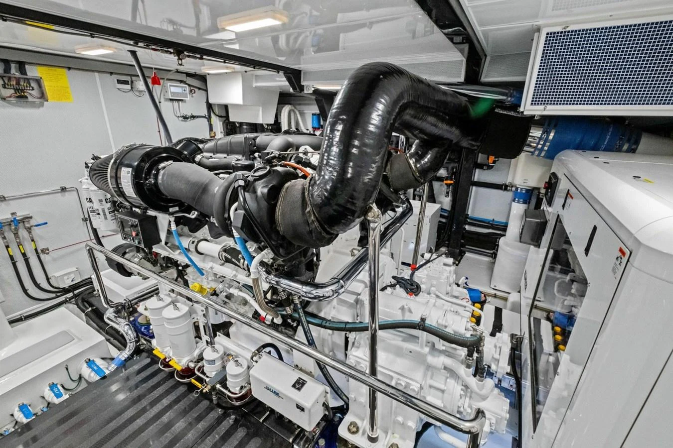 The image showcases the well-maintained engine room of the yacht, highlighting its advanced machinery and clean layout. aboard ARTEMIS II Yacht for Sale