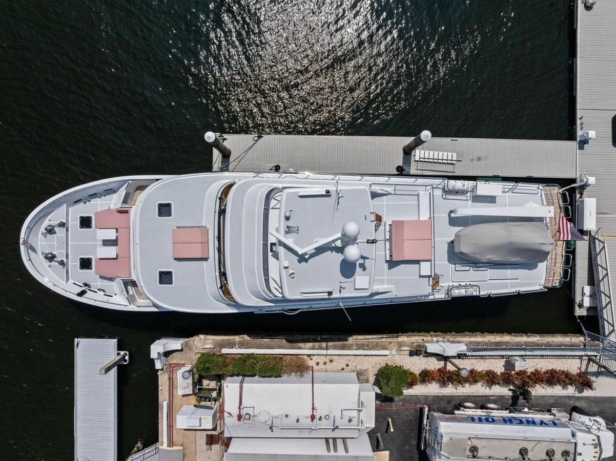 Aerial view of a luxurious yacht docked at a marina. aboard ARTEMIS II Yacht for Sale