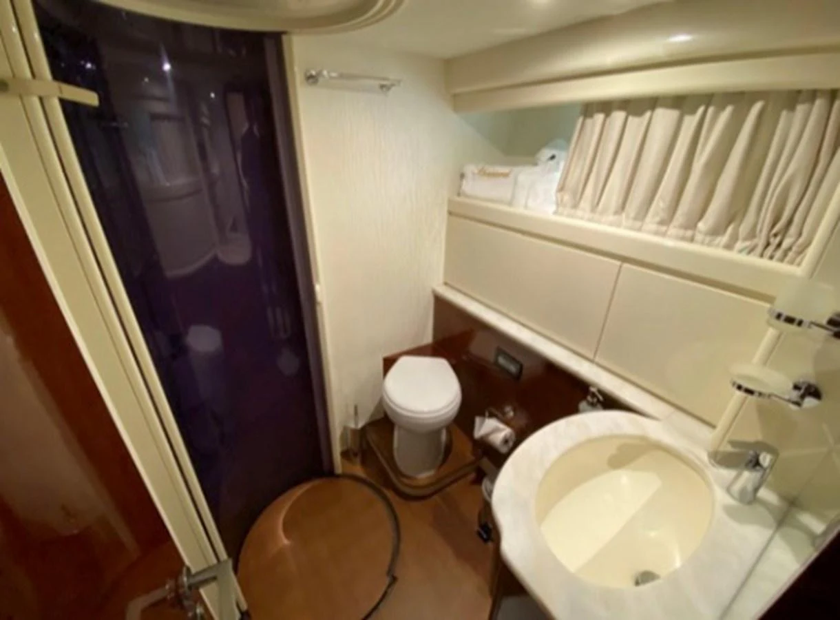 A well-appointed bathroom with modern fixtures and a clean design. aboard FERRETTI 810/78 Yacht for Sale