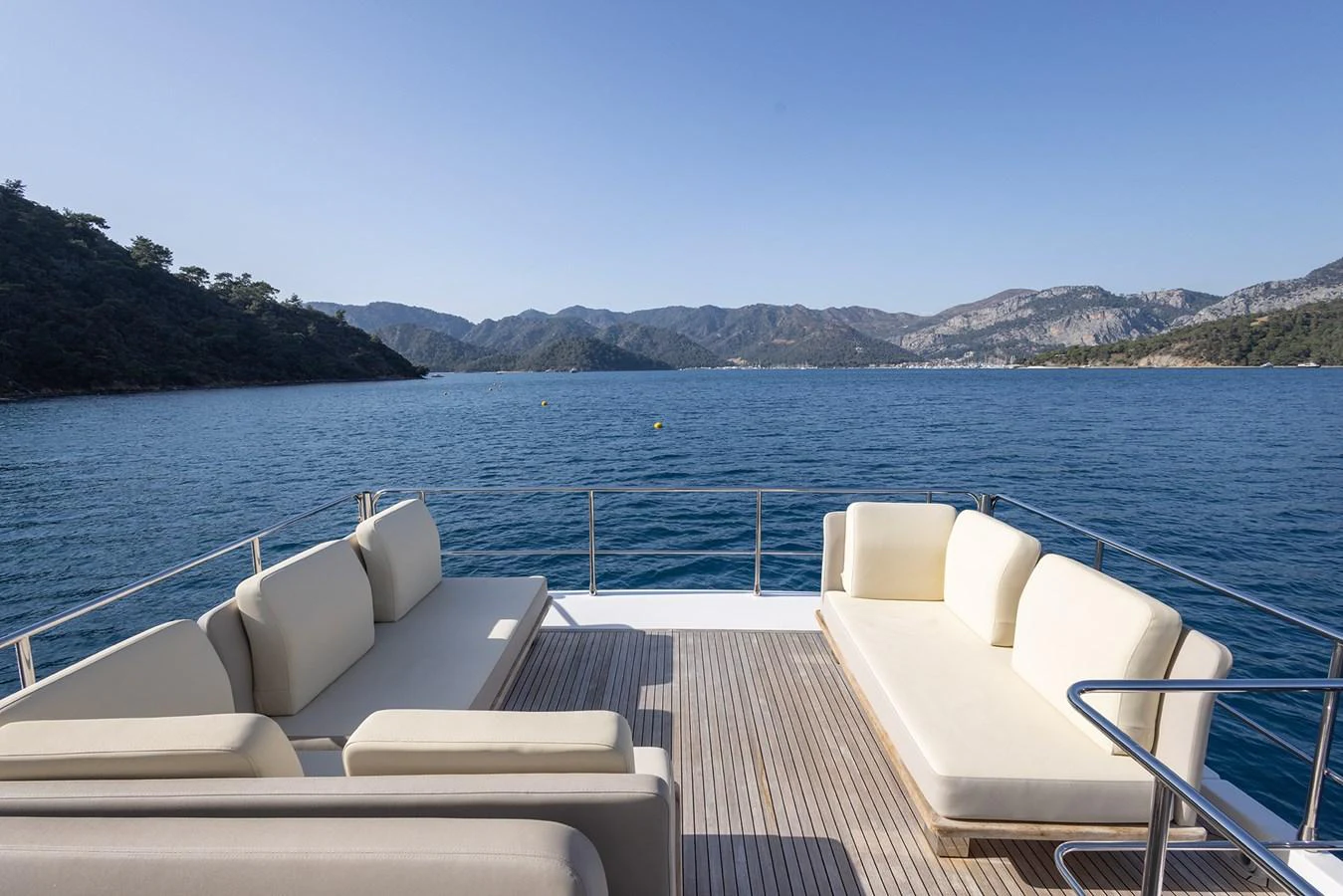The aft deck offers a serene lounging area with comfortable seating and stunning views of the surrounding waters and mountains. aboard AZ FLY 66 Yacht for Sale
