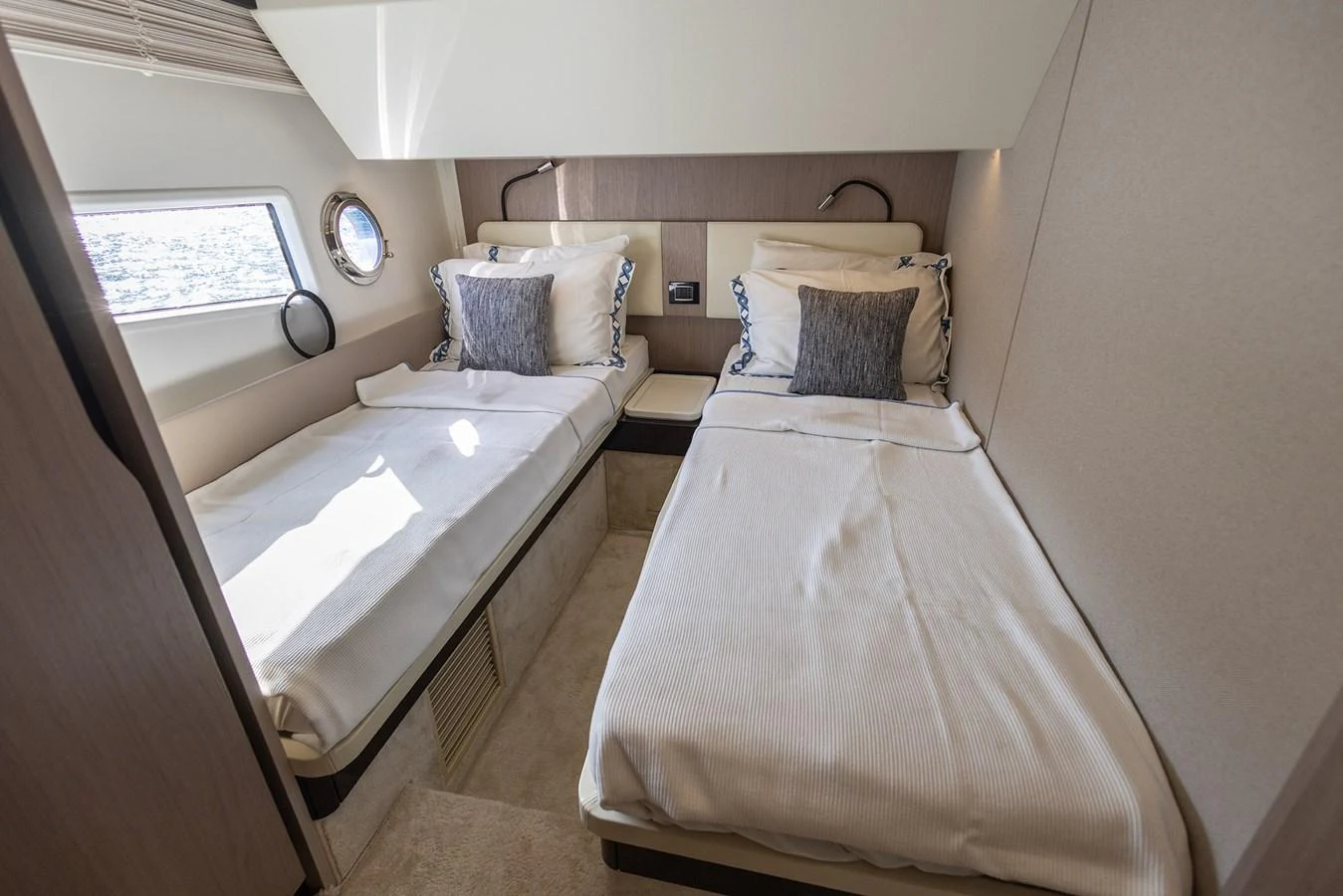 This cozy guest stateroom features twin beds and elegant decor. aboard AZ FLY 66 Yacht for Sale