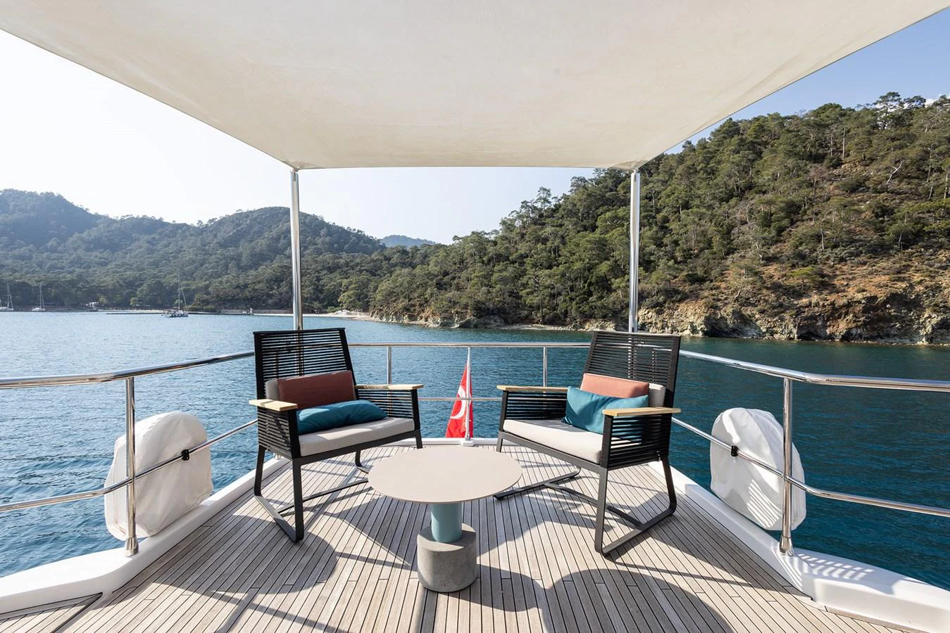 The aft deck offers a serene seating area with stunning views of the surrounding waters and landscape. aboard AZ MAGELLANO 66 Yacht for Sale