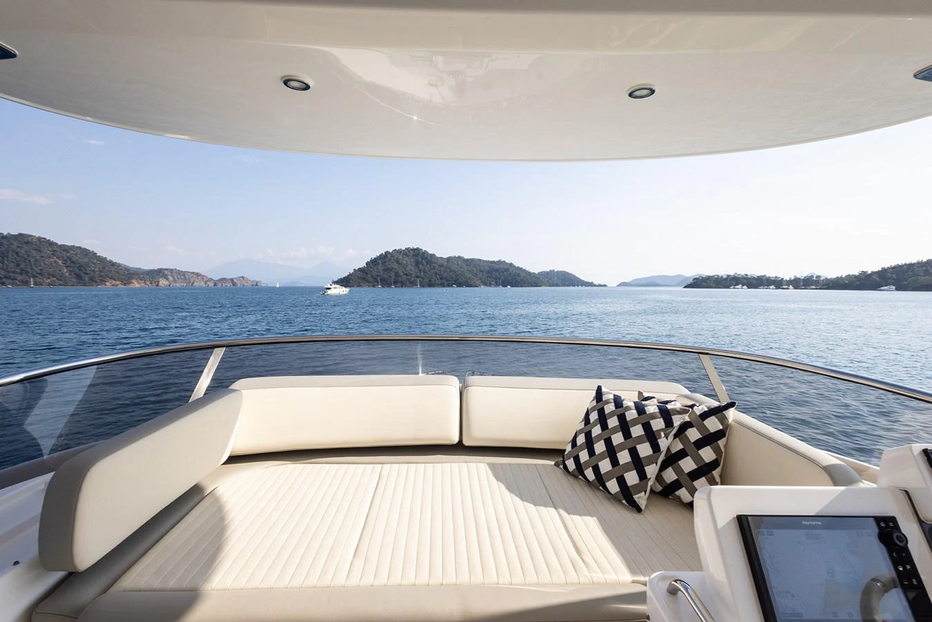 The sundeck offers a luxurious lounging area with stunning views of the surrounding waters and islands. aboard AZ MAGELLANO 66 Yacht for Sale