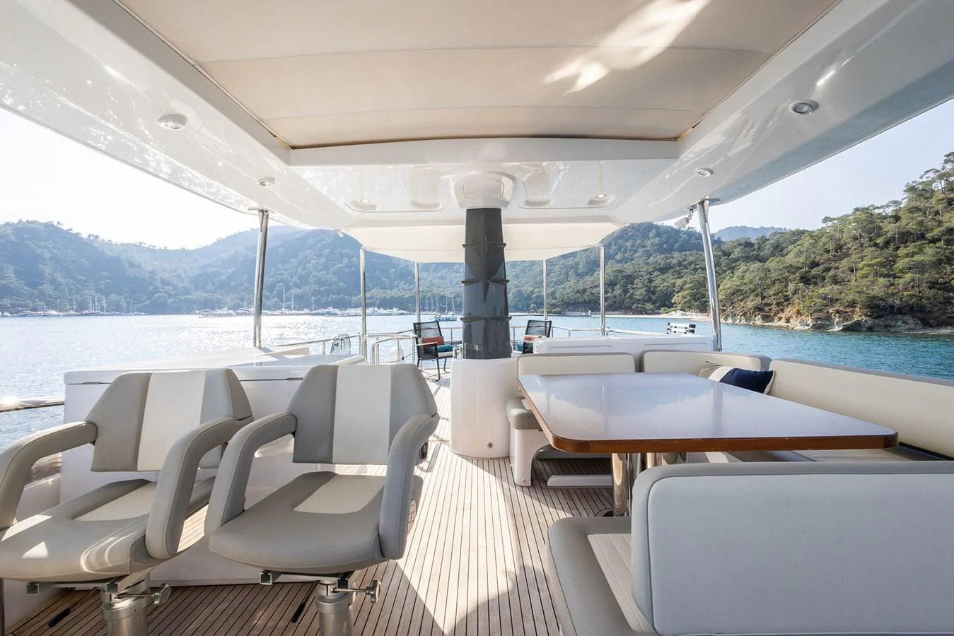 The flybridge offers a spacious seating area with stunning views of the surrounding waters. aboard AZ MAGELLANO 66 Yacht for Sale
