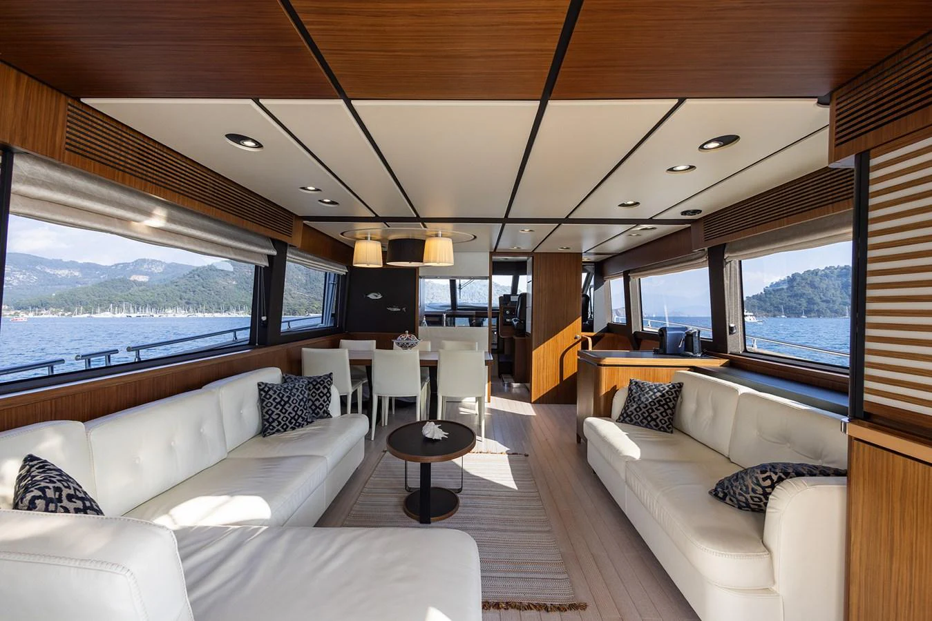The spacious salon offers panoramic views and luxurious seating, perfect for relaxation and entertaining. aboard AZ MAGELLANO 66 Yacht for Sale