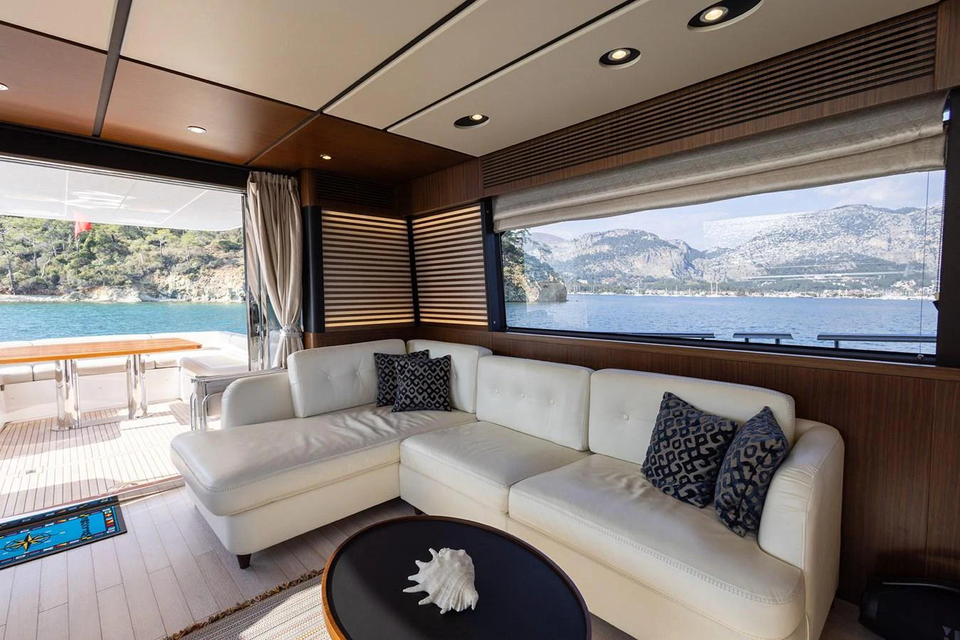 The salon offers a luxurious and comfortable seating area with stunning views of the surrounding waters. aboard AZ MAGELLANO 66 Yacht for Sale