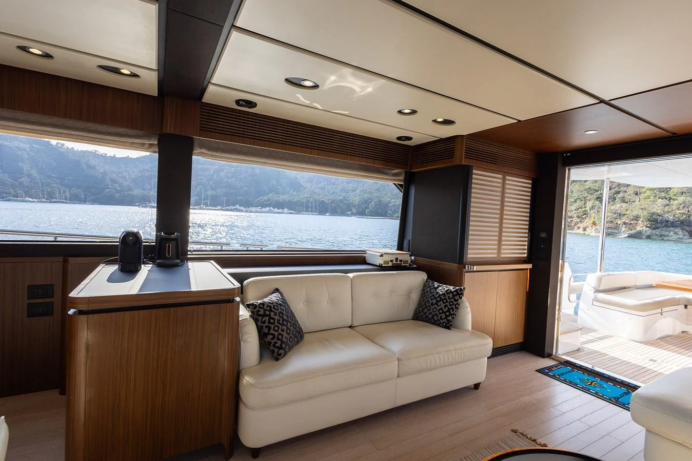 The salon offers a luxurious and comfortable space with a stunning view of the water. aboard AZ MAGELLANO 66 Yacht for Sale