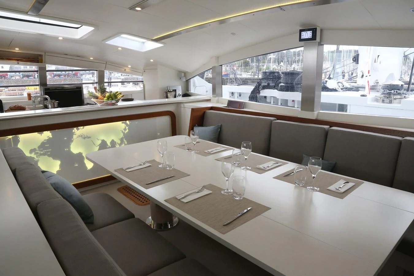 The yacht's dining area features a sleek, modern design with ample seating and elegant table settings. aboard VITALIA II Yacht for Sale