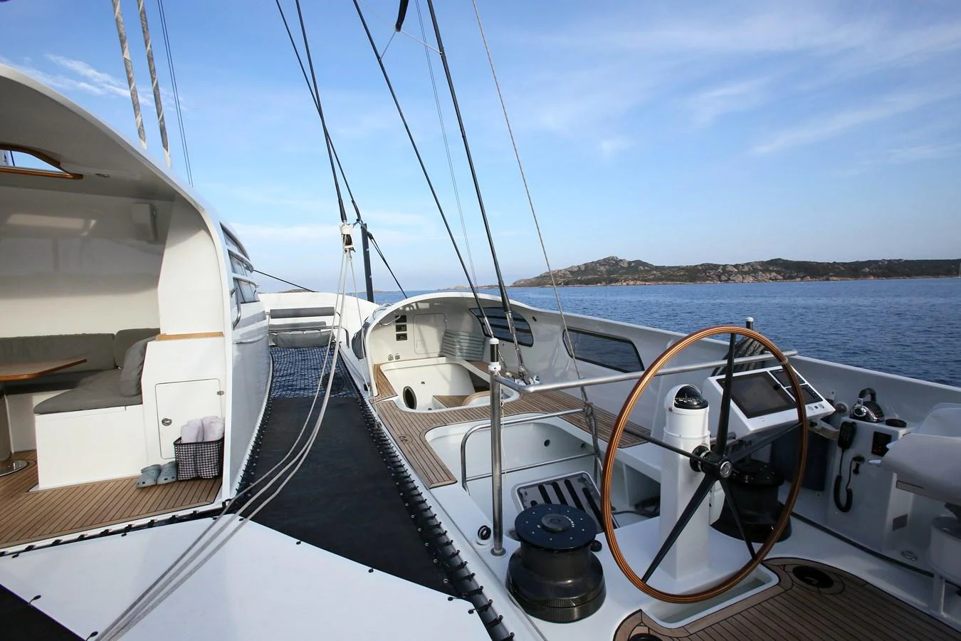 The yacht's cockpit area features a sleek design with a spacious seating area and a well-equipped helm. aboard VITALIA II Yacht for Sale