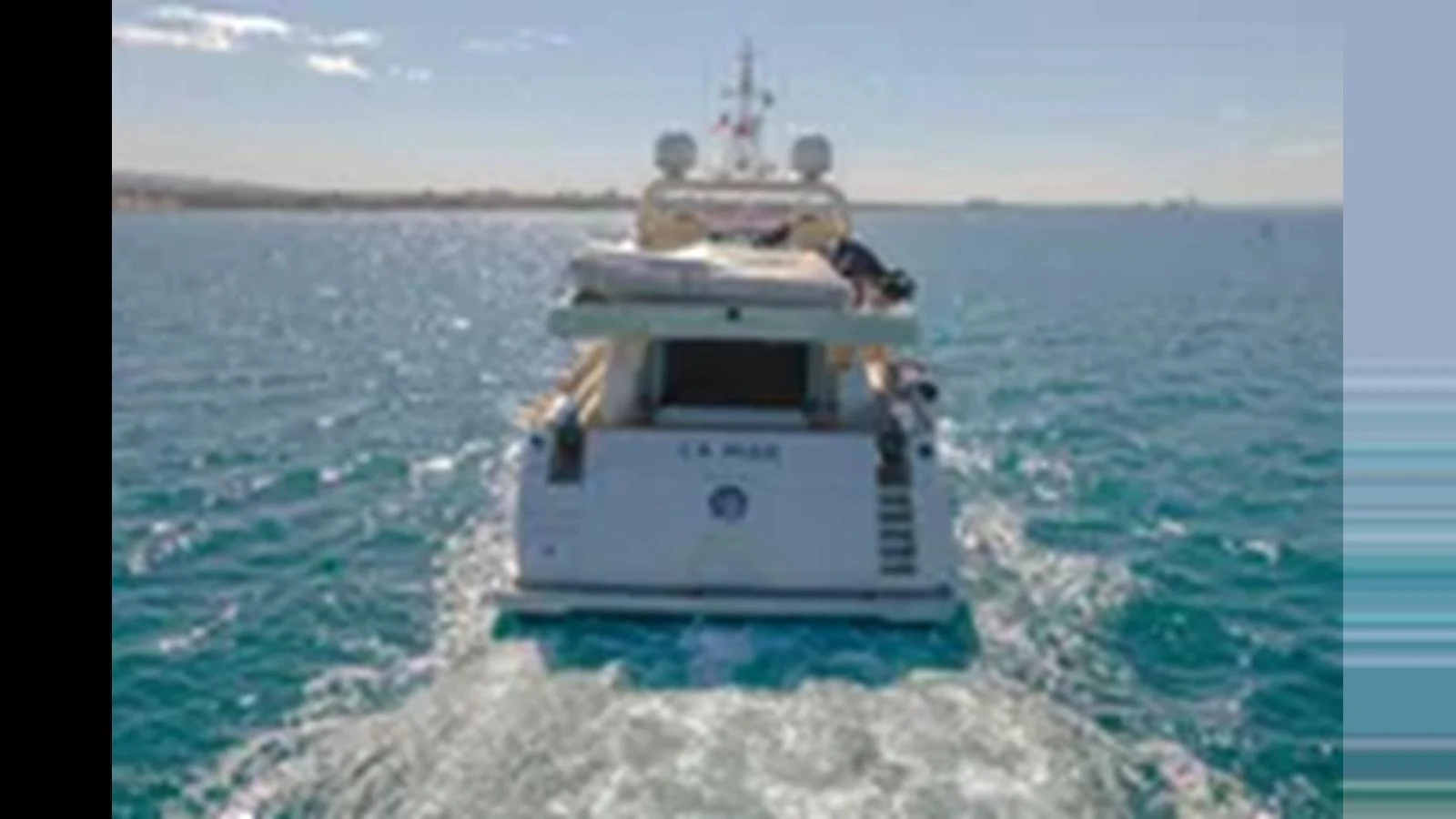 The yacht is cruising on the water, showcasing its sleek design and spacious aft deck. aboard 2012 FERRETTI YACHTS CUSTOM LINE 100 Yacht for Sale