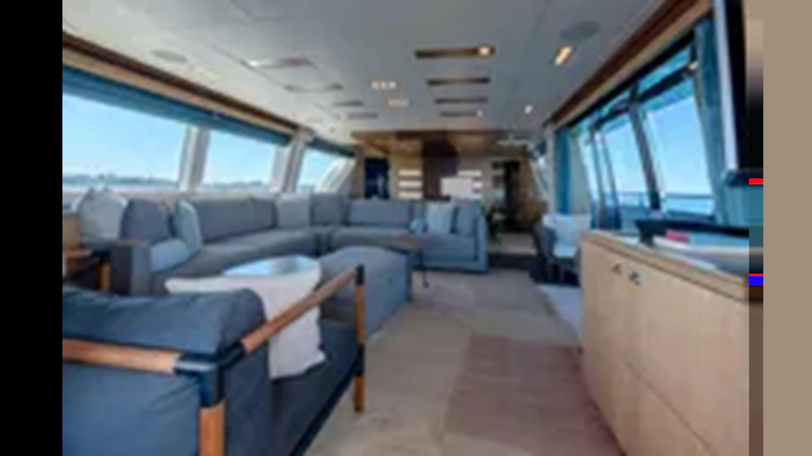 The spacious salon features plush seating and large windows for panoramic views. aboard 2012 FERRETTI YACHTS CUSTOM LINE 100 Yacht for Sale