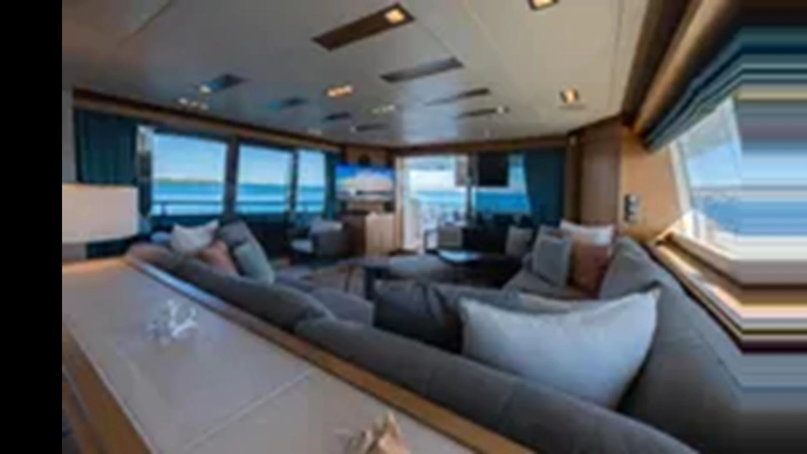 The yacht's salon offers a spacious and comfortable seating area with panoramic views of the sea. aboard 2012 FERRETTI YACHTS CUSTOM LINE 100 Yacht for Sale