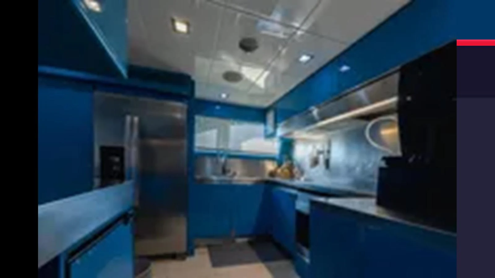 The yacht's galley features modern appliances and a sleek, contemporary design. aboard 2012 FERRETTI YACHTS CUSTOM LINE 100 Yacht for Sale