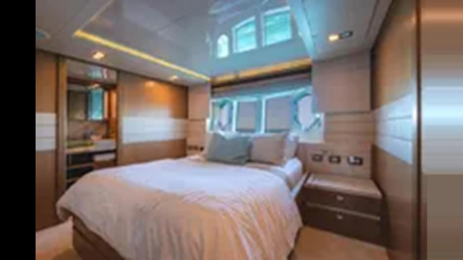 A luxurious stateroom featuring a comfortable bed and modern decor. aboard 2012 FERRETTI YACHTS CUSTOM LINE 100 Yacht for Sale