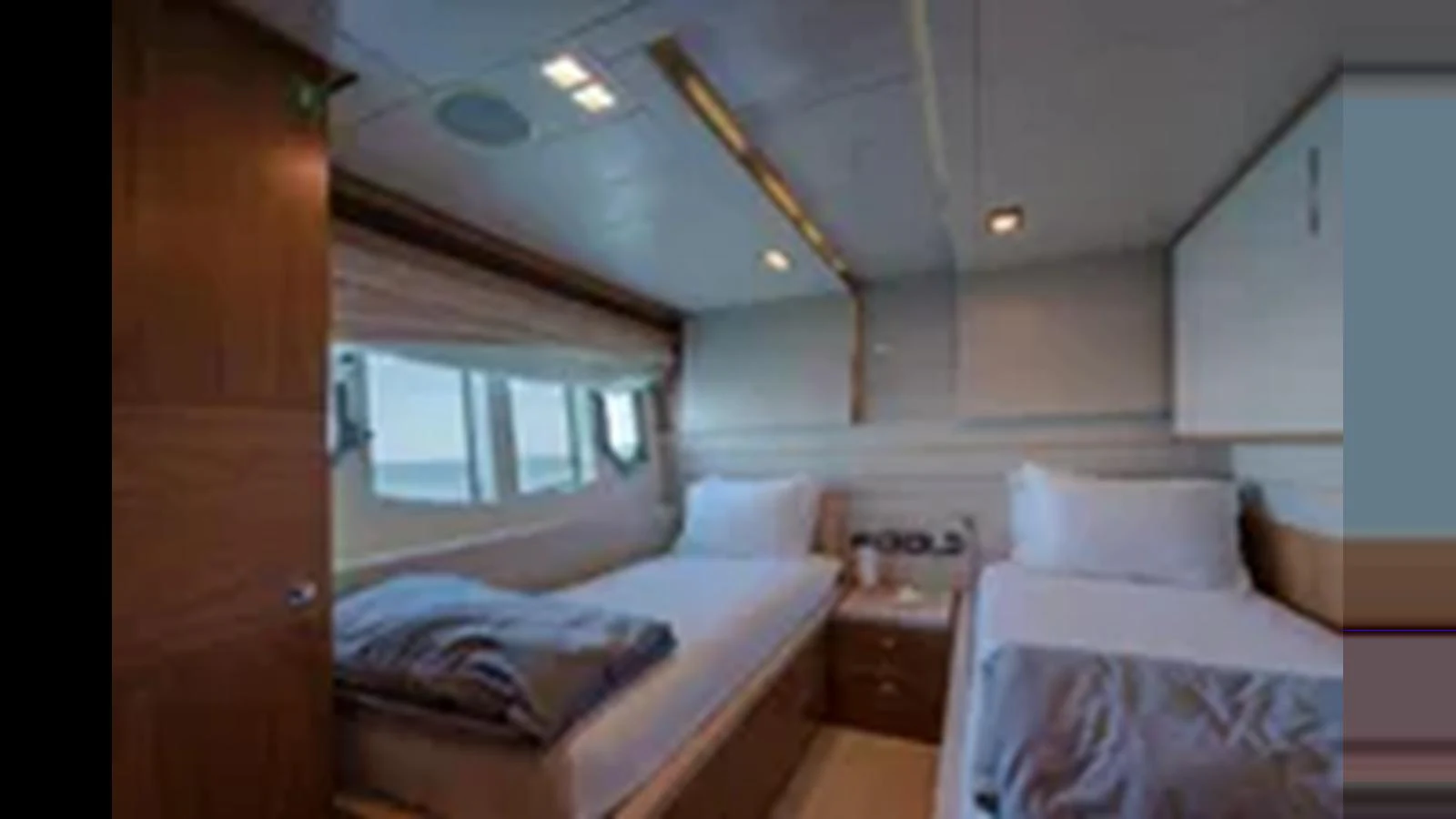 The guest stateroom features twin beds and a serene ambiance. aboard 2012 FERRETTI YACHTS CUSTOM LINE 100 Yacht for Sale