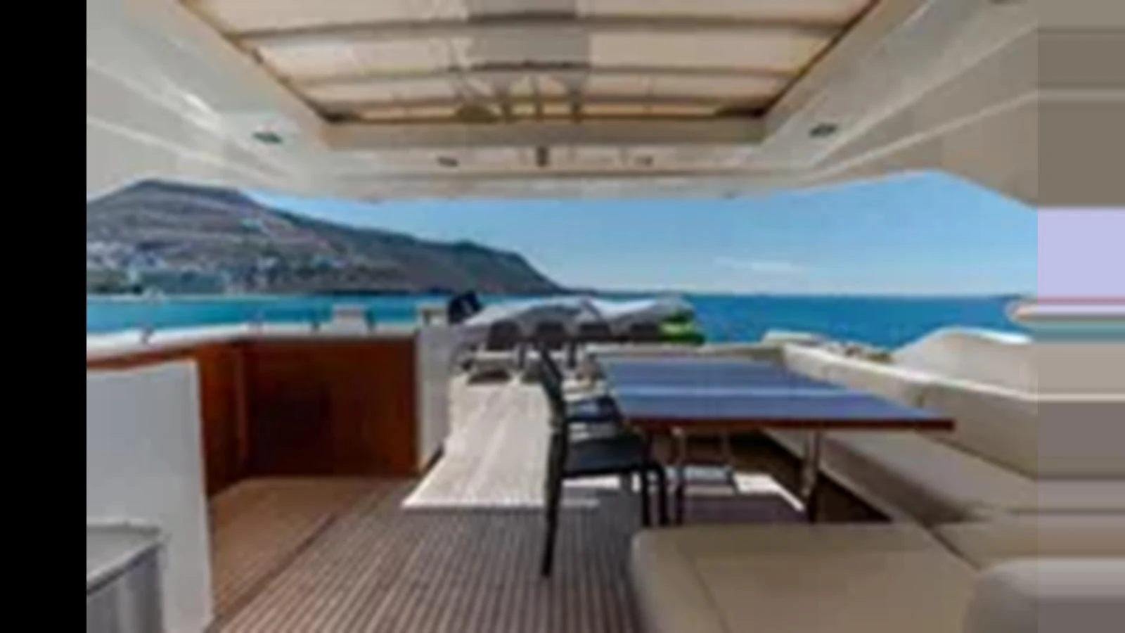 The aft deck offers a spacious and inviting area for alfresco dining with stunning sea views. aboard 2012 FERRETTI YACHTS CUSTOM LINE 100 Yacht for Sale