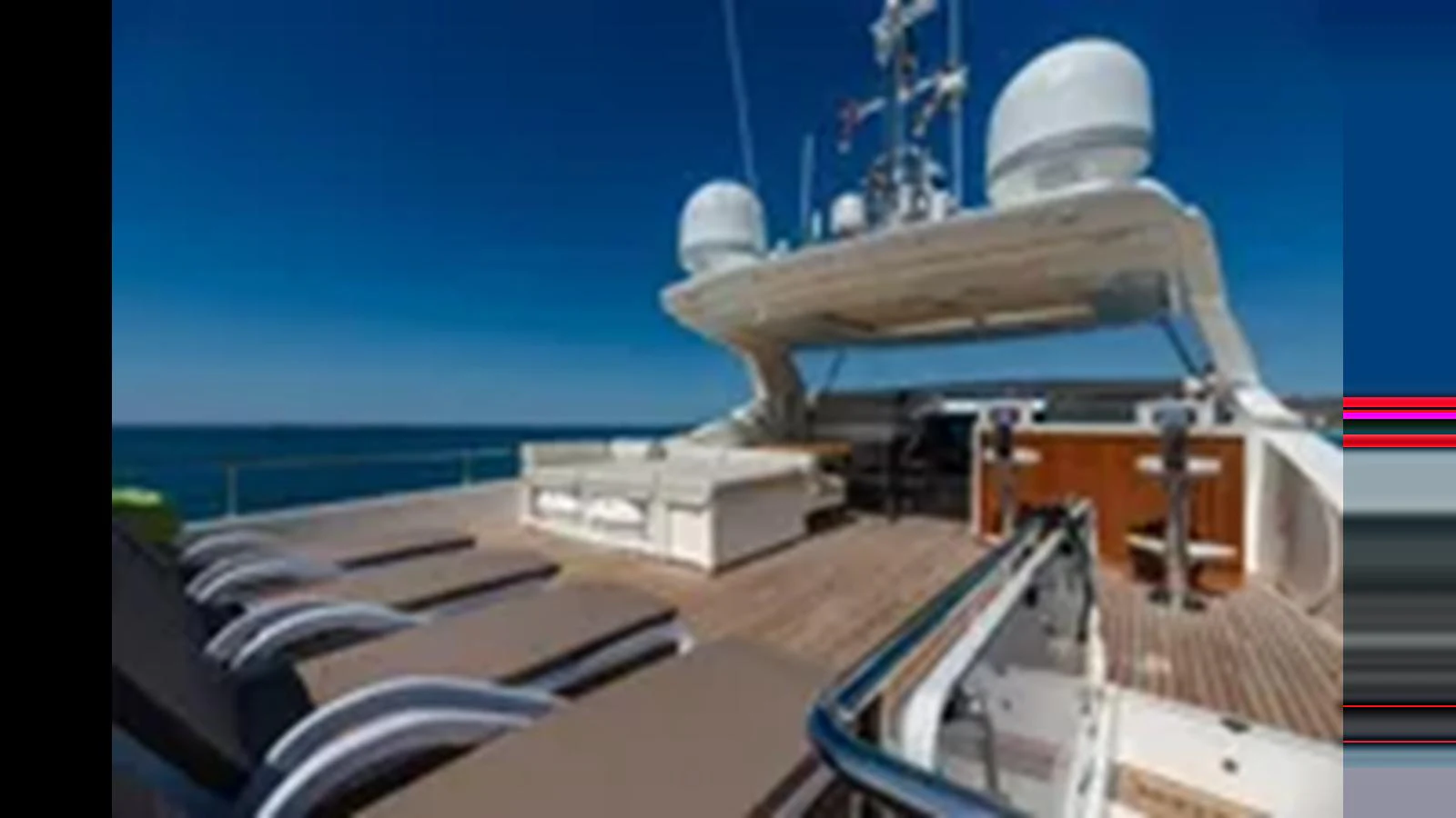 The sundeck offers a luxurious space for relaxation with sun loungers and a shaded seating area. aboard 2012 FERRETTI YACHTS CUSTOM LINE 100 Yacht for Sale